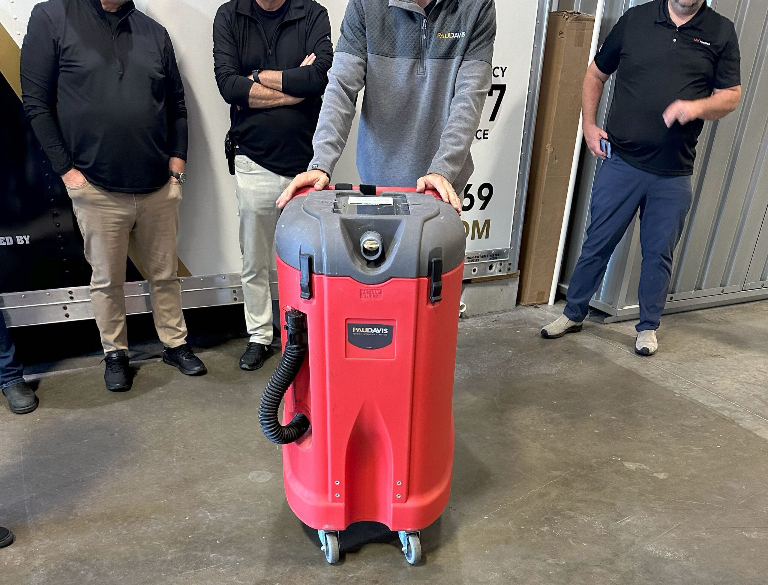 PDRNETX Team Holding Machine Cropped