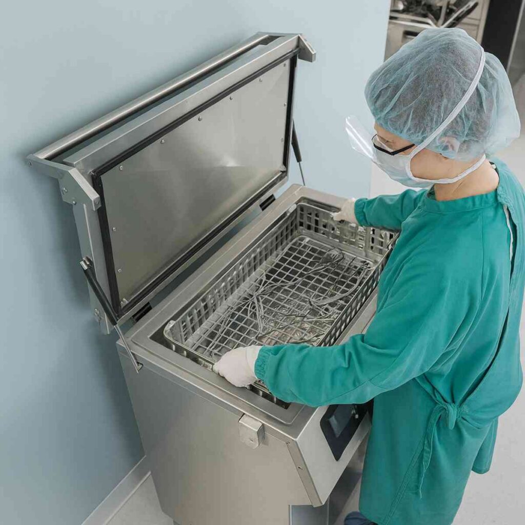 Technician using ultrasonic cleaning equipment to sanitize contents and restore items after damage in Northeast Texas.